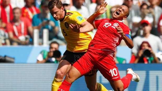 Tunisia's Khazri and Belgium's Vertonghen vie for the ball. (AP Photo)