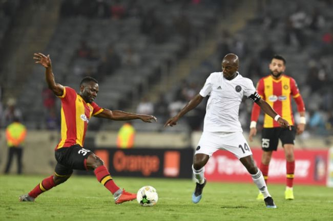 Franck Kom in a fierce duel with Musa Nyatama. Photo | Lefty Shivambu | Gallo Images