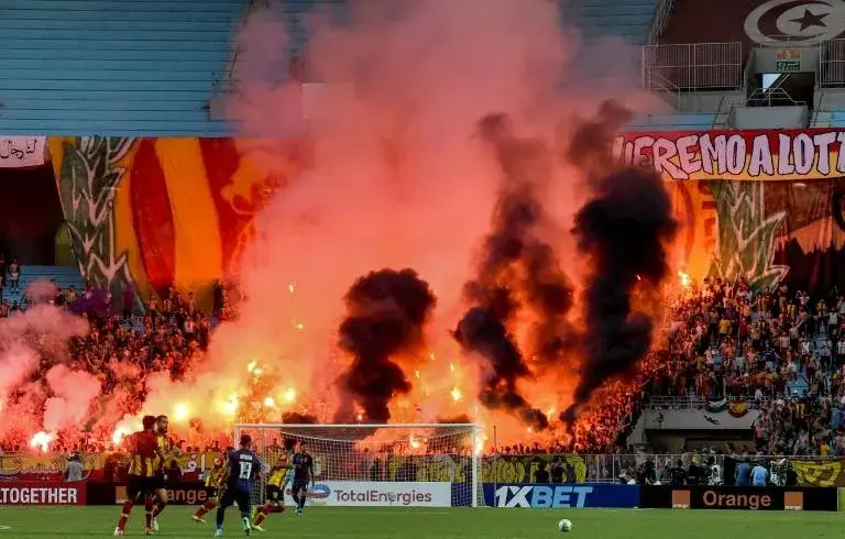 Esperance of Tunisia supporters light flares during the first leg of a CAF Champions League semi-final against Al Ahly of Egypt in Rades on Saturday. Photo | Fethi Belaïd | AFP