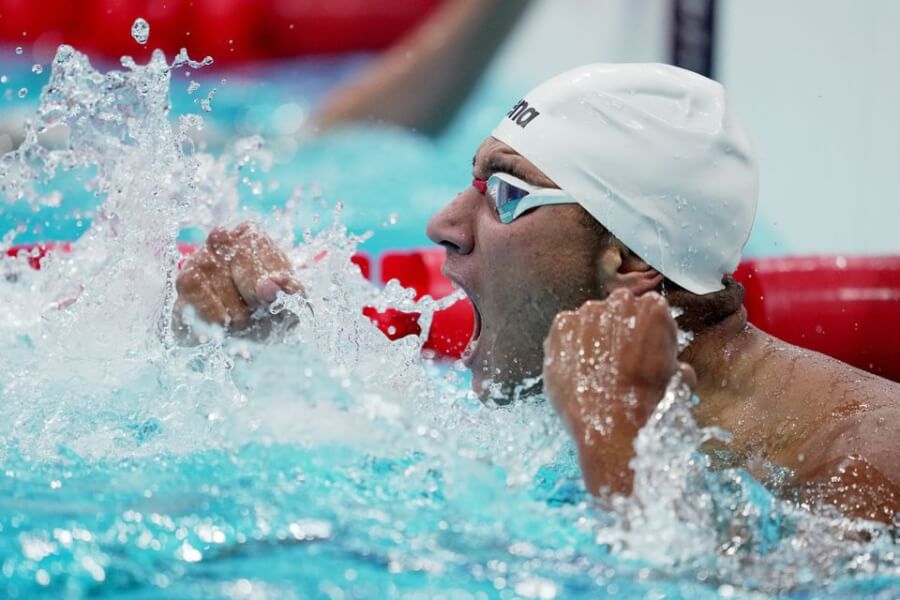 Tokyo 2020 Olympics - Swimming - Men's 400m Freestyle - Final - Tokyo Aquatics Centre - Tokyo, Japan - July 25, 2021. Ahmed Hafnaoui of Tunisia reacts after winning gold. REUTERS | Aleksandra Szmigiel